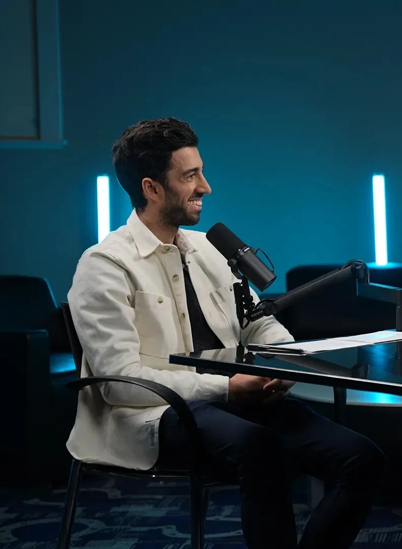 Jon Youshaei recording a podcast