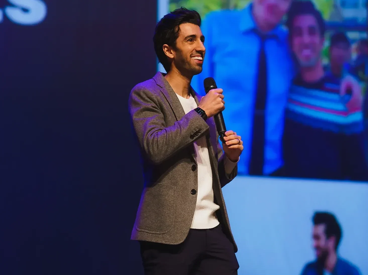 Jon Youshaei speaking on stage