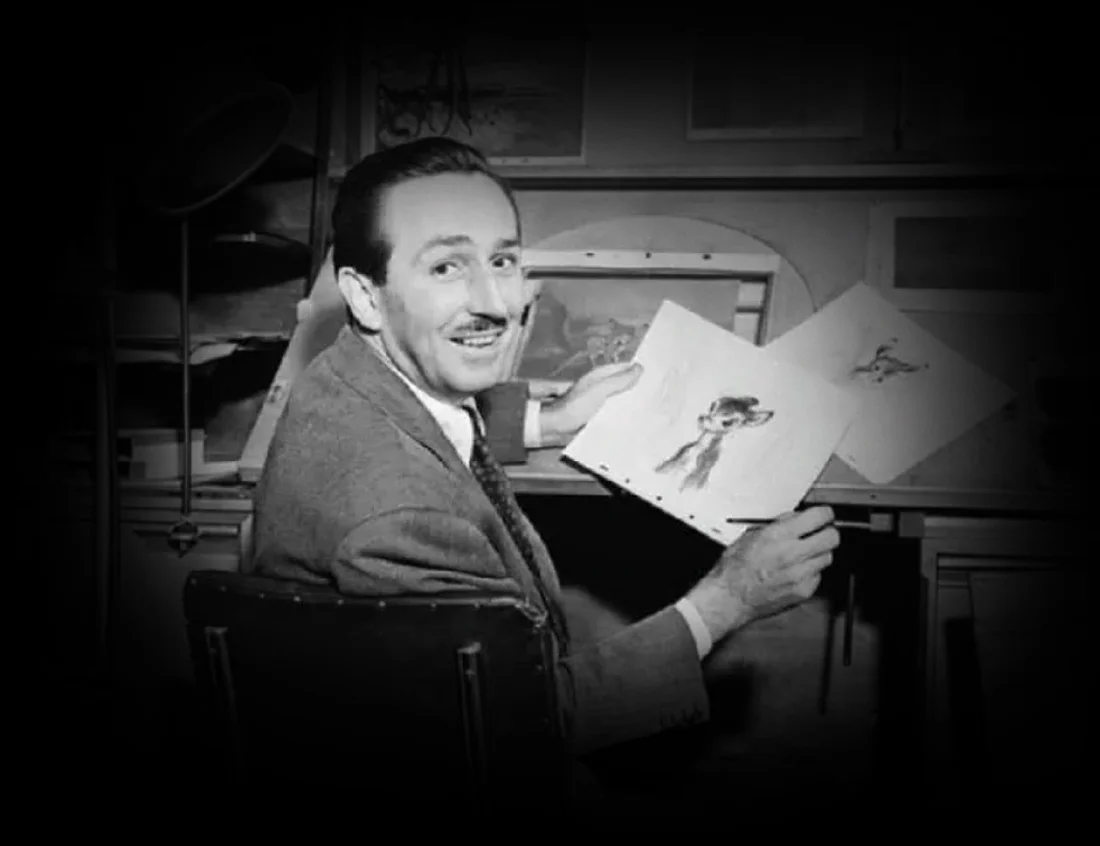 Walt Disney at his desk